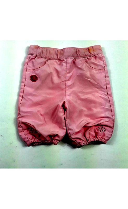 Pantalon rose couleur de chine fleur aux chevilles
