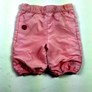 Pantalon rose couleur de chine fleur aux chevilles