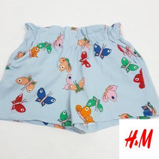 Short bleu motif papillon