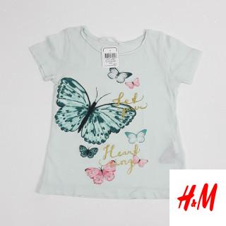 T-shirt bleu pale imprimé papillon " let your head sing"