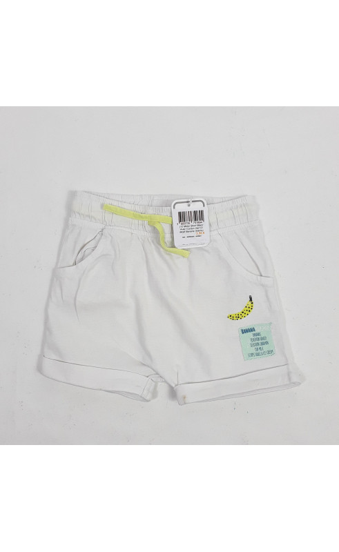 short blanc avec cordon vert et motif banane