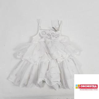 Robe blanche avec froufrou et noeud argenté