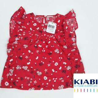 blouse rouge avec froufrou au manches motif fleurs