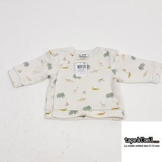 pull blanc avec attache devant motifs animaux