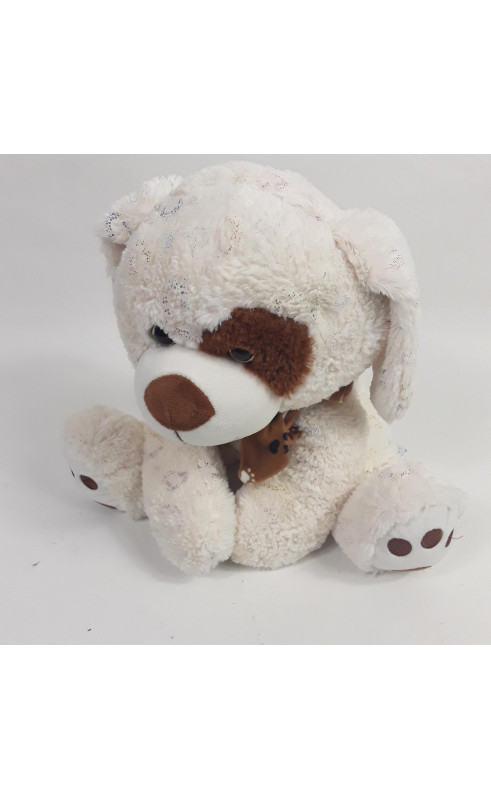 peluche chien blanc avec motif cœur et nœud marron au niveau de coup