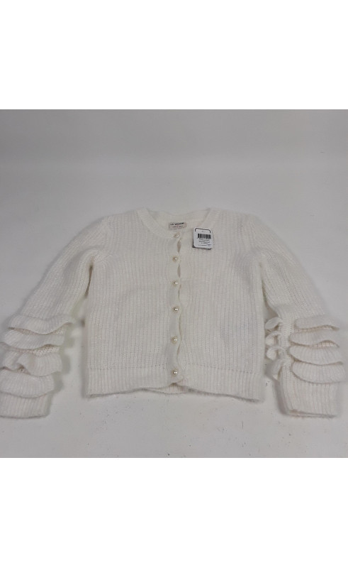 gilet blanc avec froufrou sur les manche bouton perle